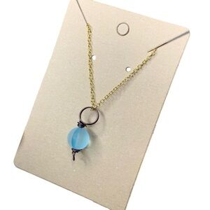 Gold sea glass necklace